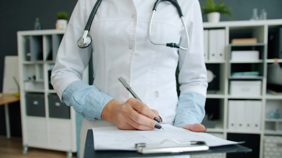 A healthcare professional reviews operational documents